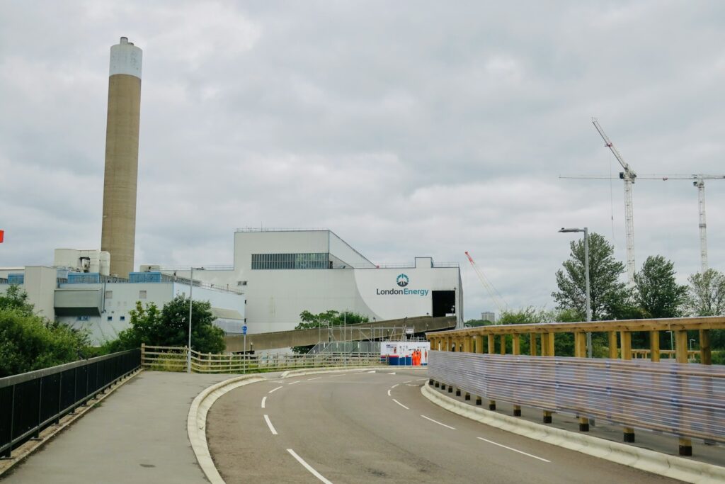 a road with a building in the background